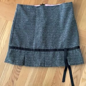 Nubbly textured cute-as-a-button skirt.
